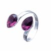 Amethyst Ring - Rhodium: A captivating purple gemstone set in a gleaming rhodium-plated band